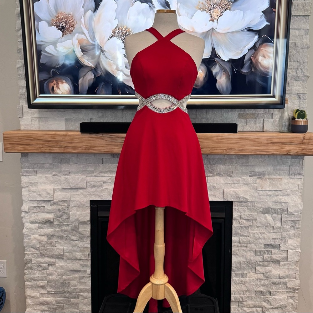Red high-low dress with rhinestone embellishments